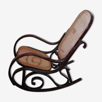 Rocking-chair sitting and canine backrest