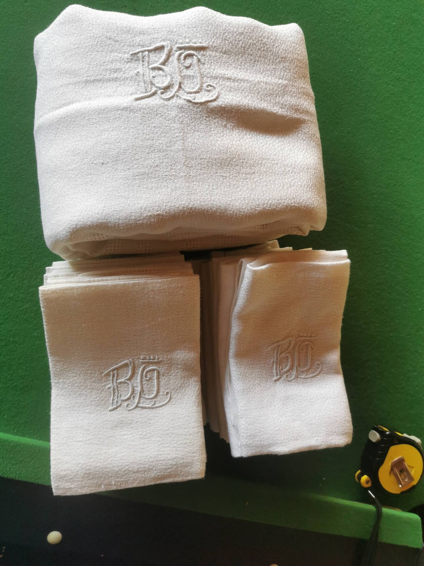 Set of 16 table napkins and an old floral damask tablecloth.