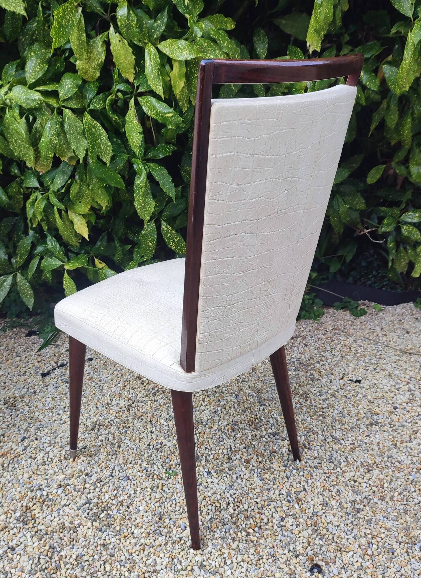 Set of 4 Vintage Mid-Century Modern Chairs with tapered metal legs.