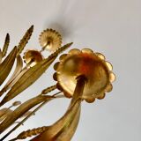 Golden suspension 5 fires with a bouquet of ears of wheat