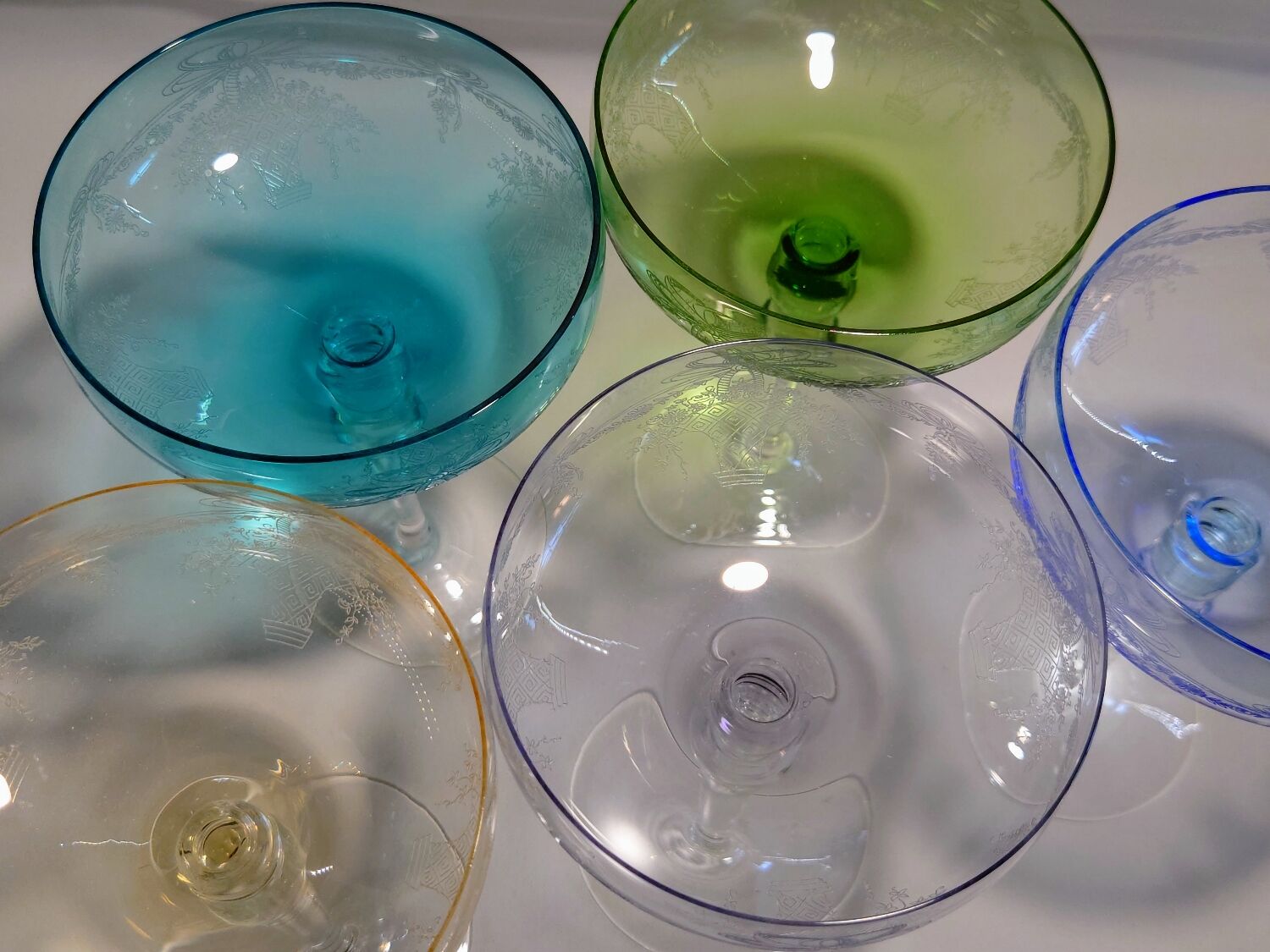 5 colored champagne glasses