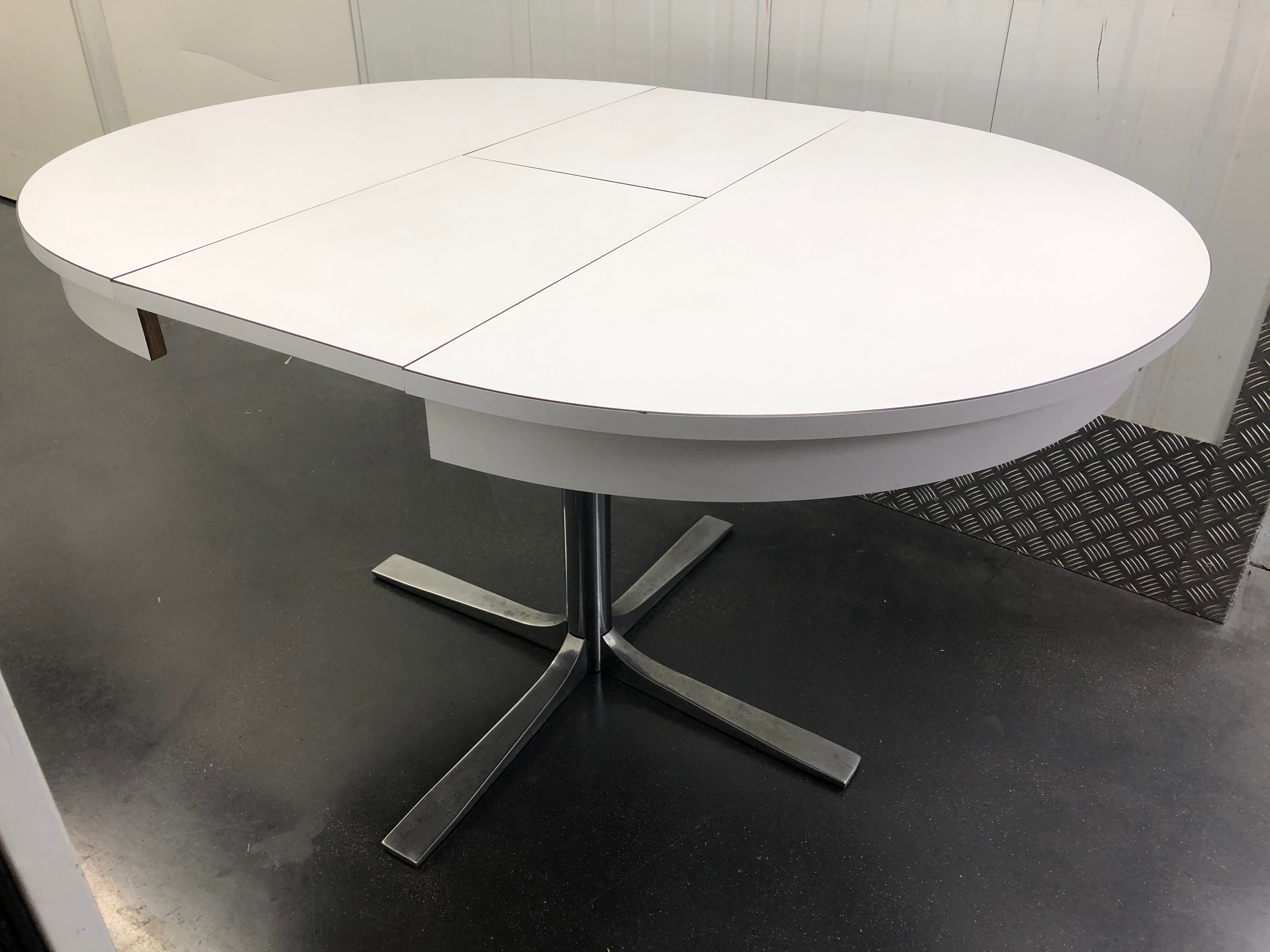 Rosalie round table with white extensions and chrome foot circa 1970
