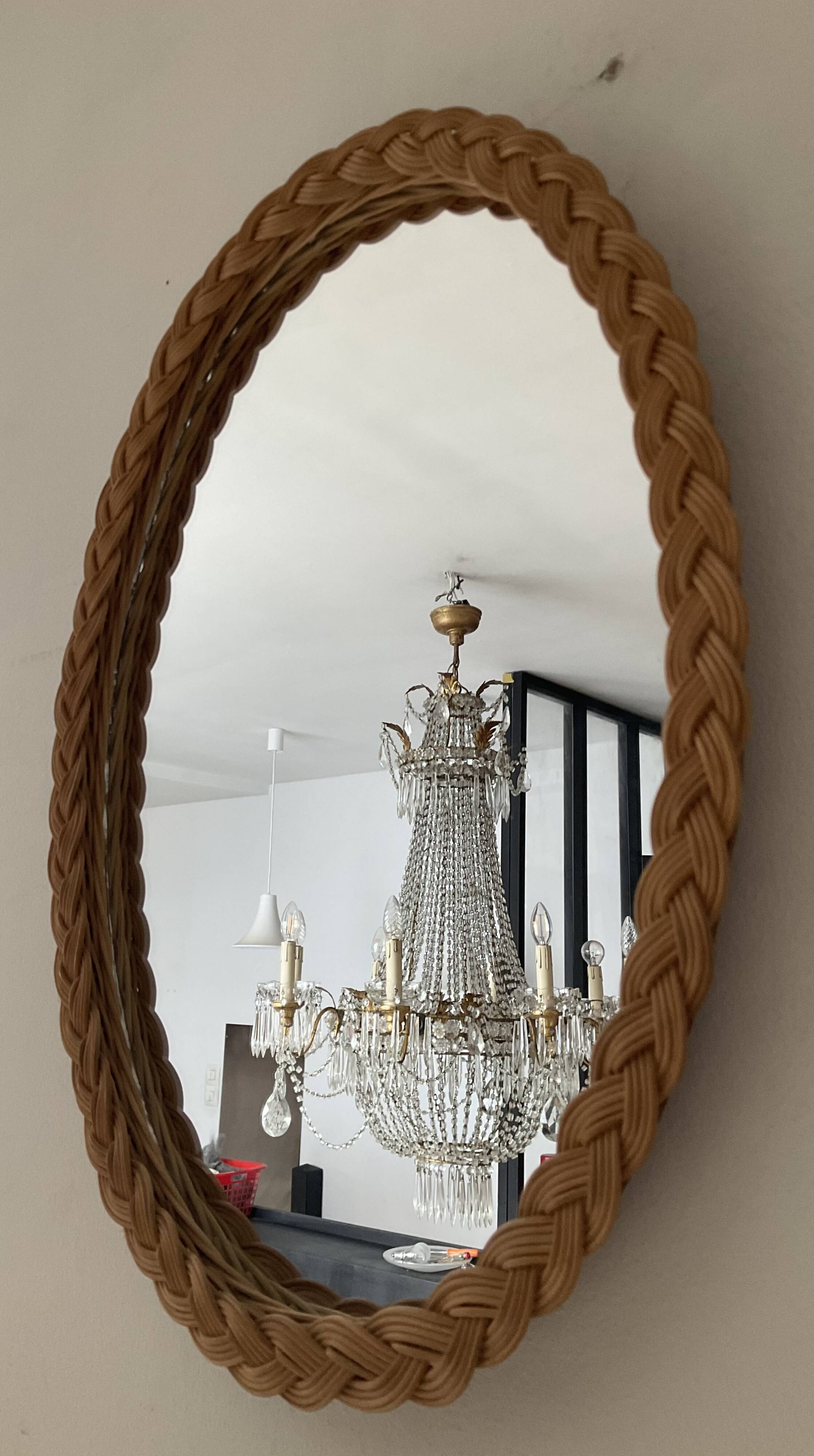 Vintage oval rattan mirror