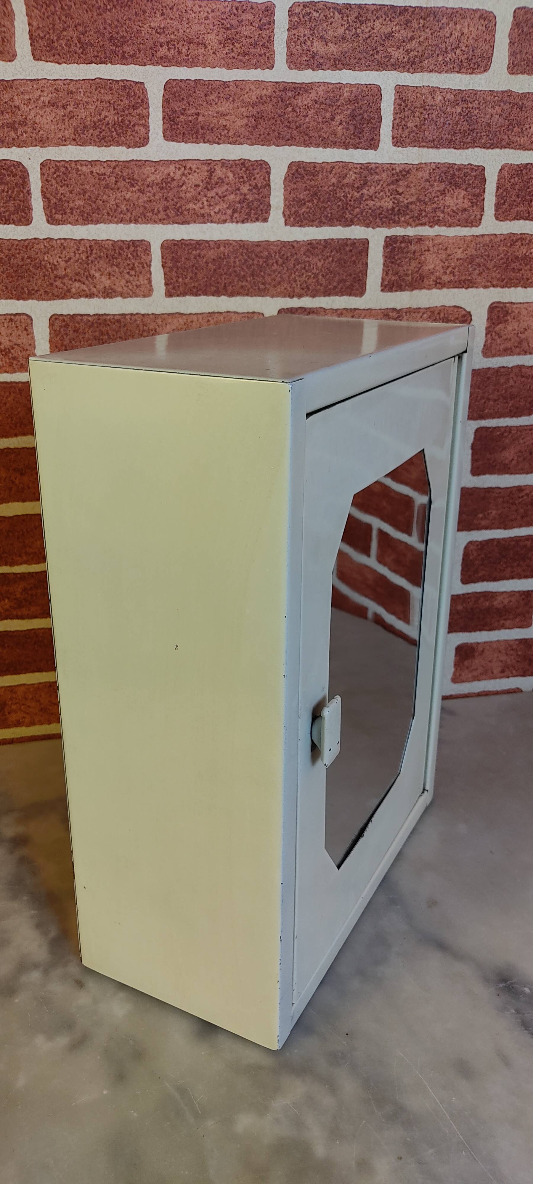 Sheet metal bathroom cabinet with mirror