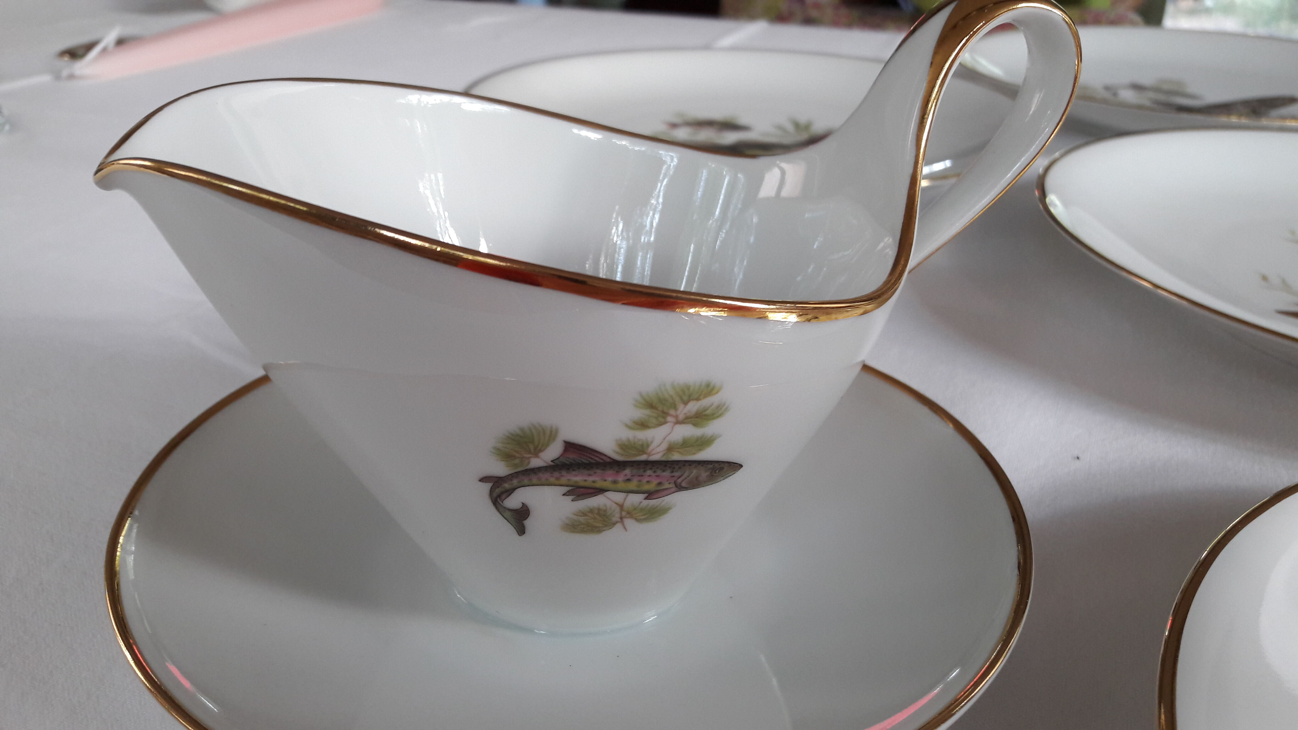 Ancient porcelain service fish theme