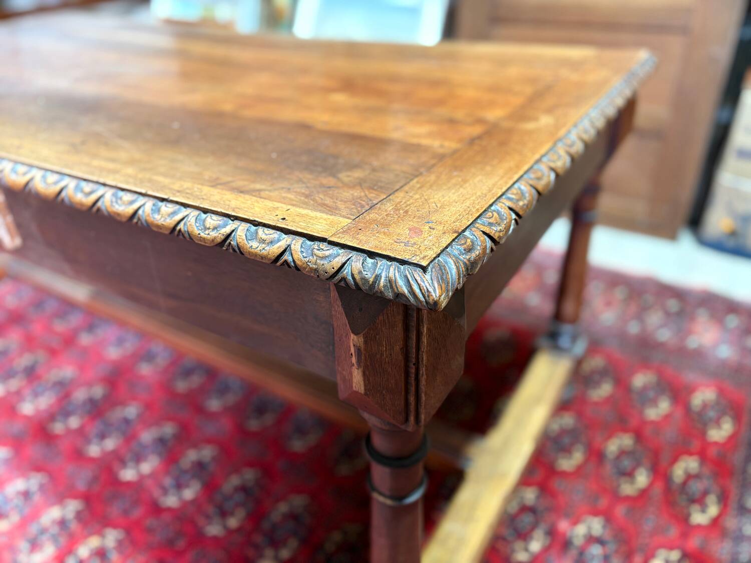 Large antique carved wooden desk in Renaissance style