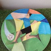 Osvaldo Perruzzi designer of polychrome faience plates.