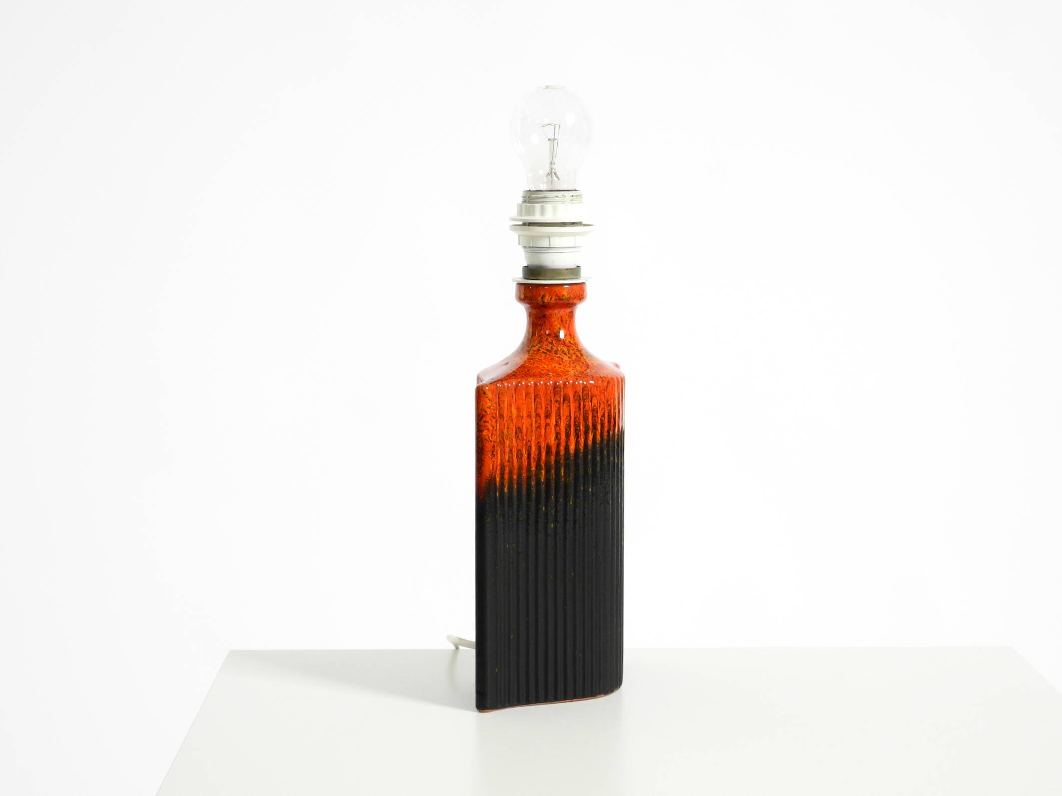 Unique 1960s ceramic table lamp in red and black by Kaiser Leuchten