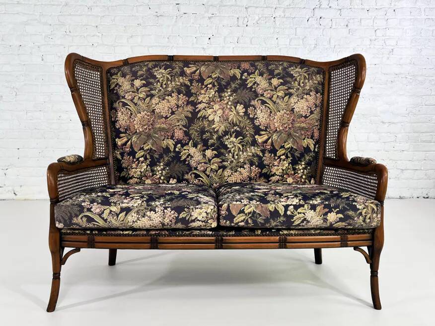 Wingback 2-seater sofa in carved wood, cane and fabric