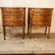 Pair of walnut crossbow chests of drawers