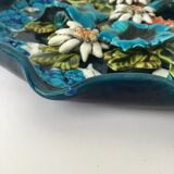 Decorative plate in relief with floral motif