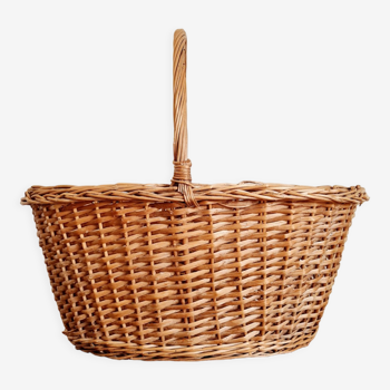 Old basket in woven rattan