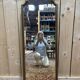 Miroir entre 2 en bois doré