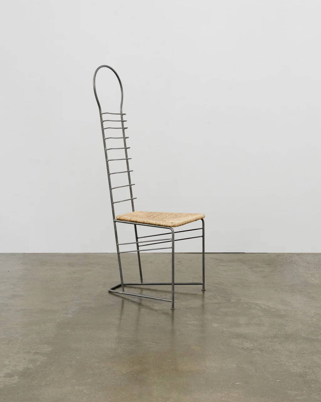 Chaise sculpturale vintage en acier et paille