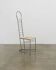 Vintage sculptural steel and straw chair
