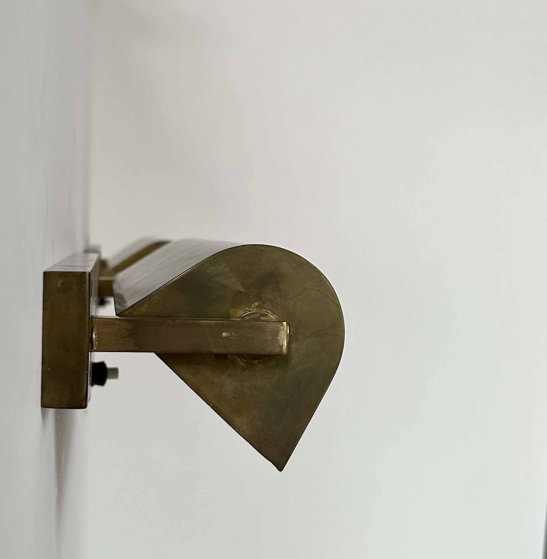 Pair of vintage modernist wall lights, adjustable in brass, France 1940