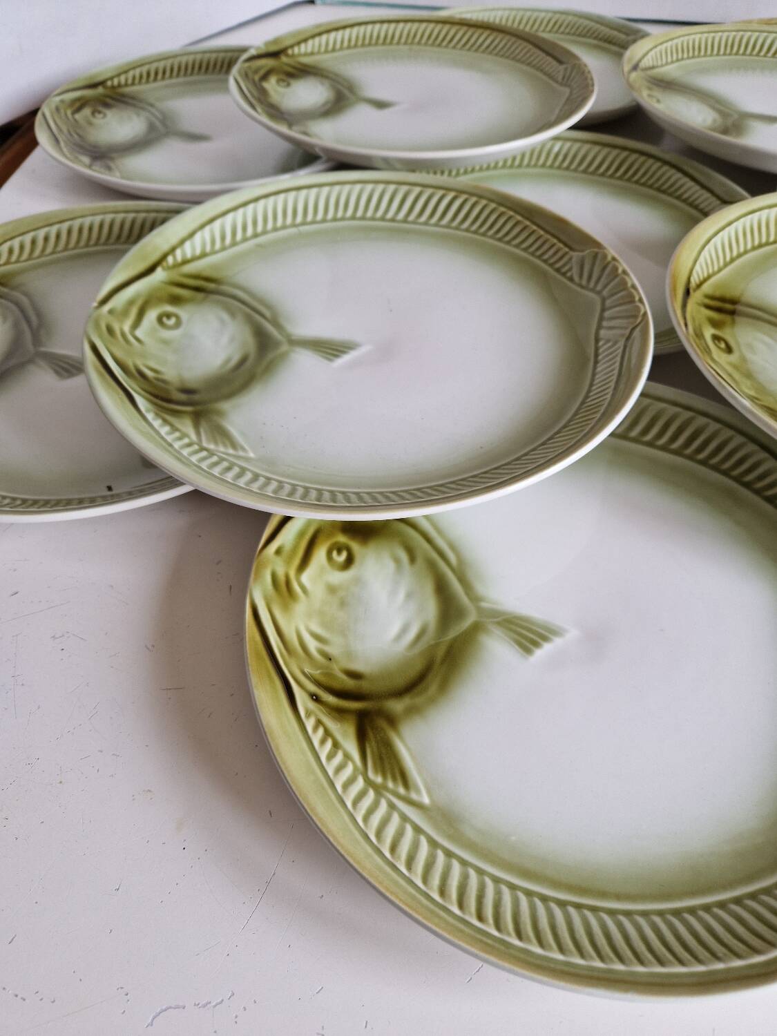 Set of 12 fish plates from the Moulin des Loups factory in Orchies