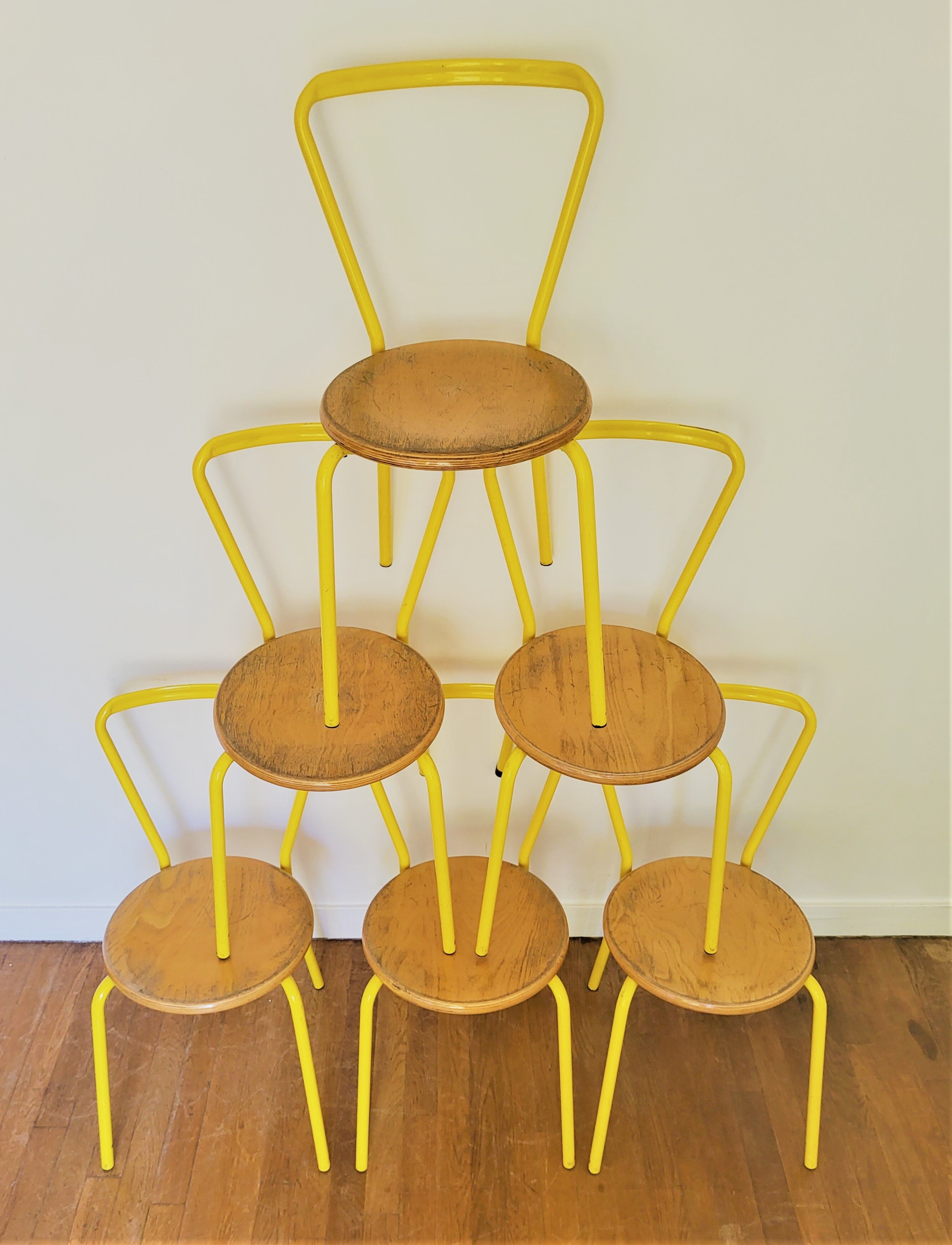 Vintage yellow school chairs from the 90s