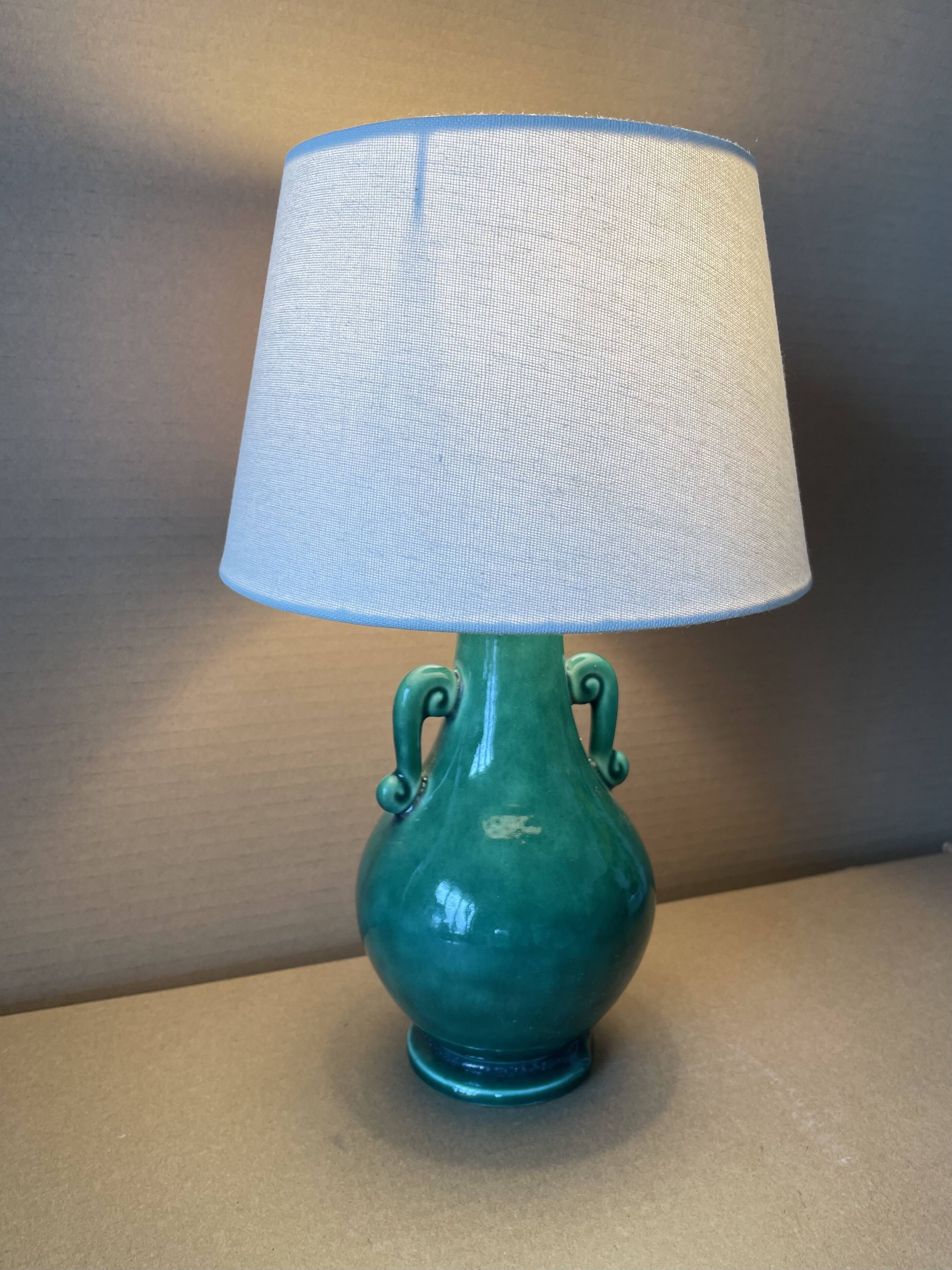 Old green ceramic lamp