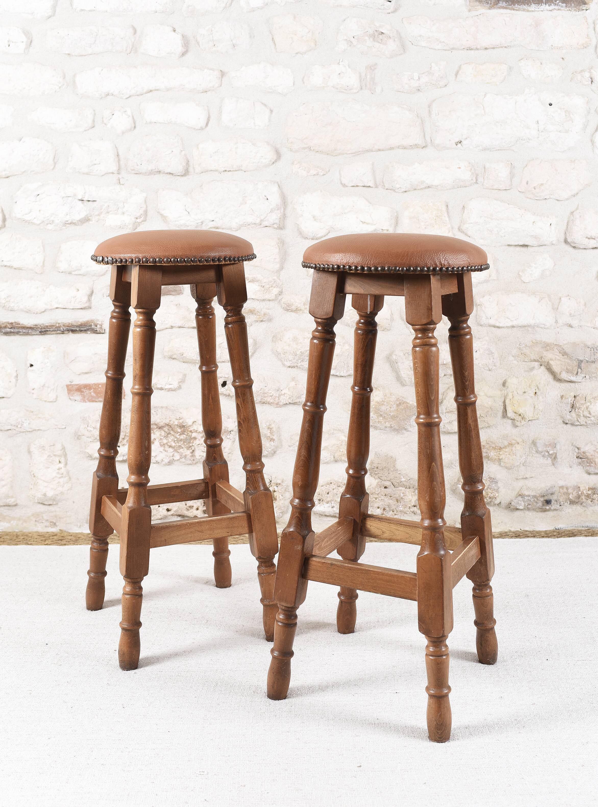 Antique bar stools, brown leather and wood