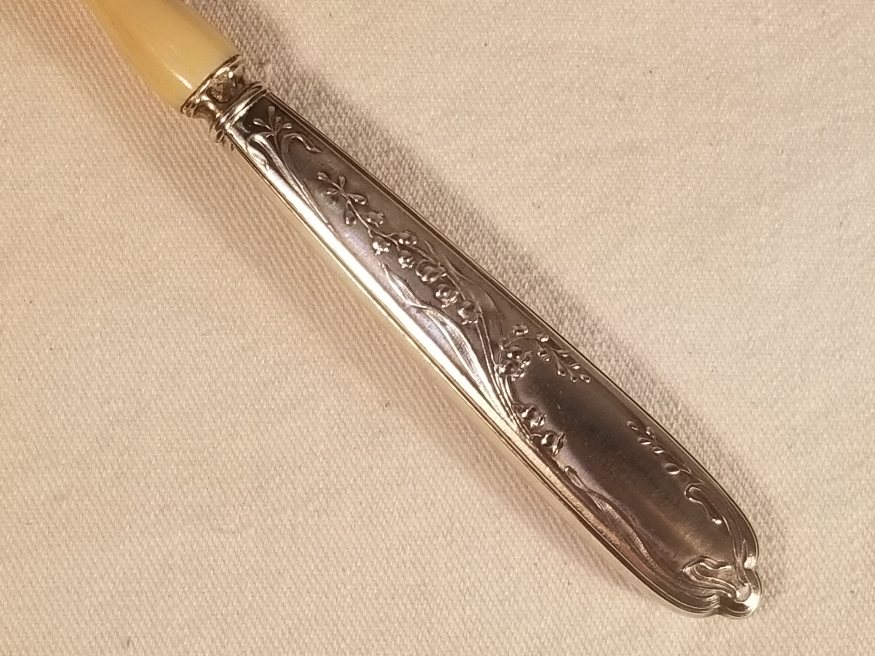 Old ivory silver porridge spoon