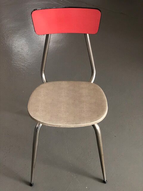 Table, chairs and kitchen furniture in red and black formica