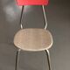 Table, chairs and kitchen furniture in red and black formica