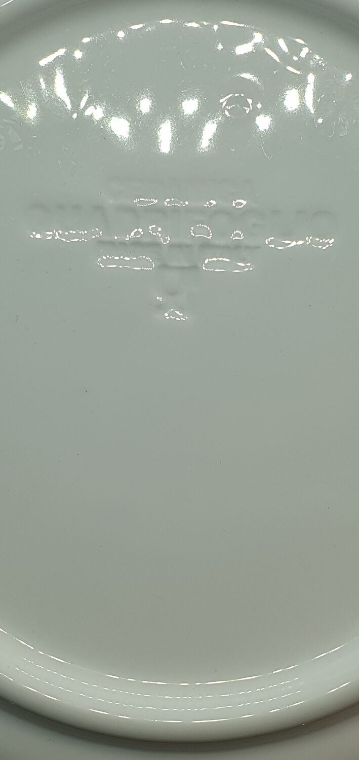 8 white ceramic plates