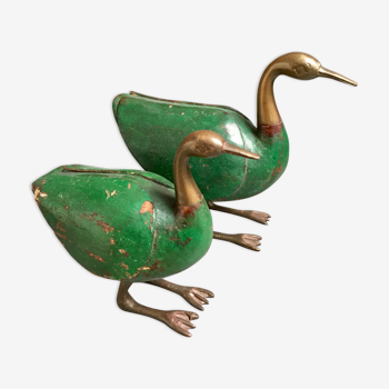 Couple of wood and brass geese