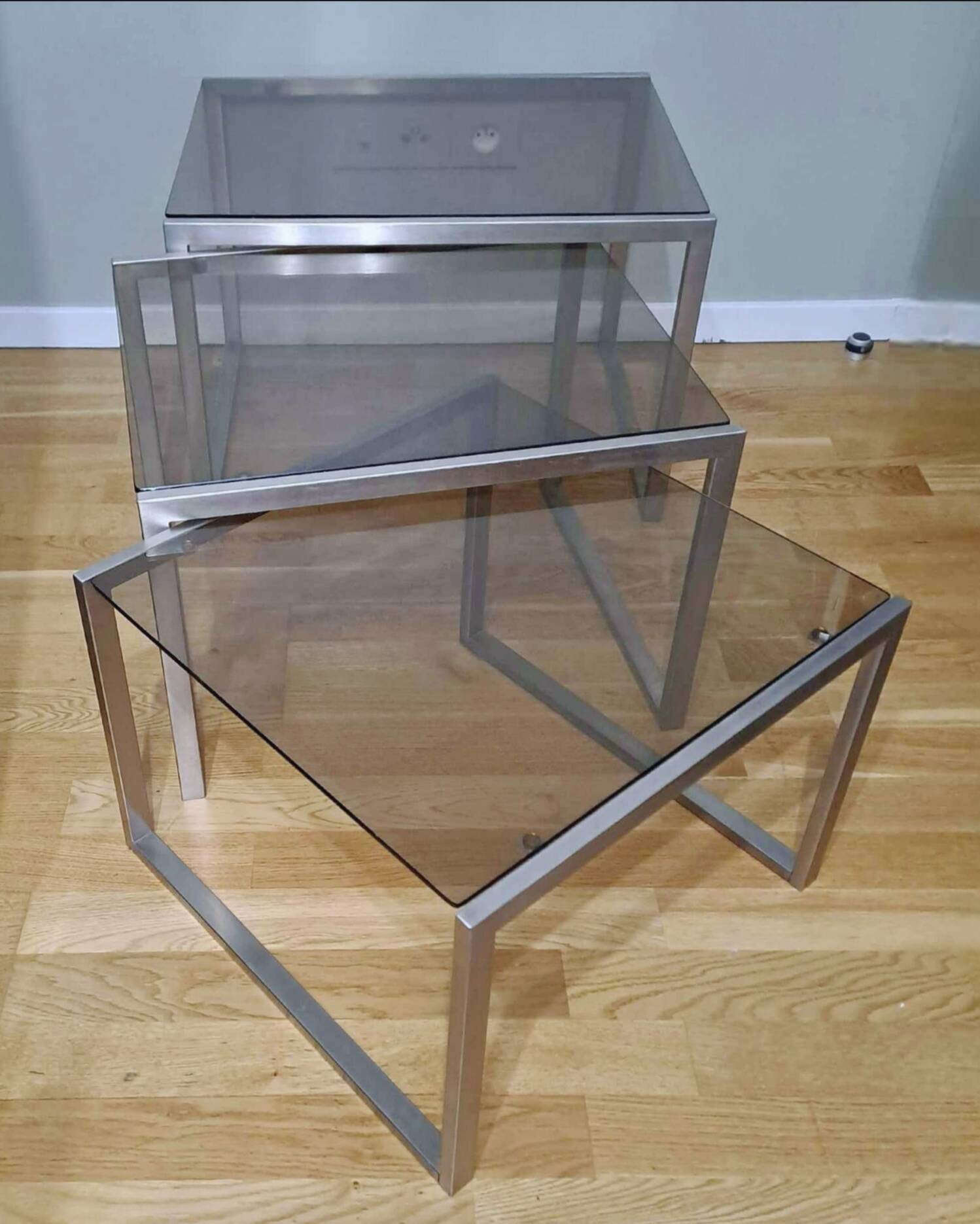 Chrome and smoked glass designer nesting table