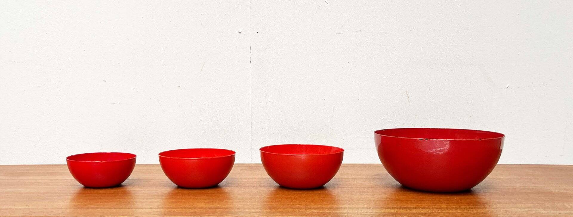Modern mid-century red enamel bowl sets by Kaj Franck for Finel, Finland, 1960s, set of 4.