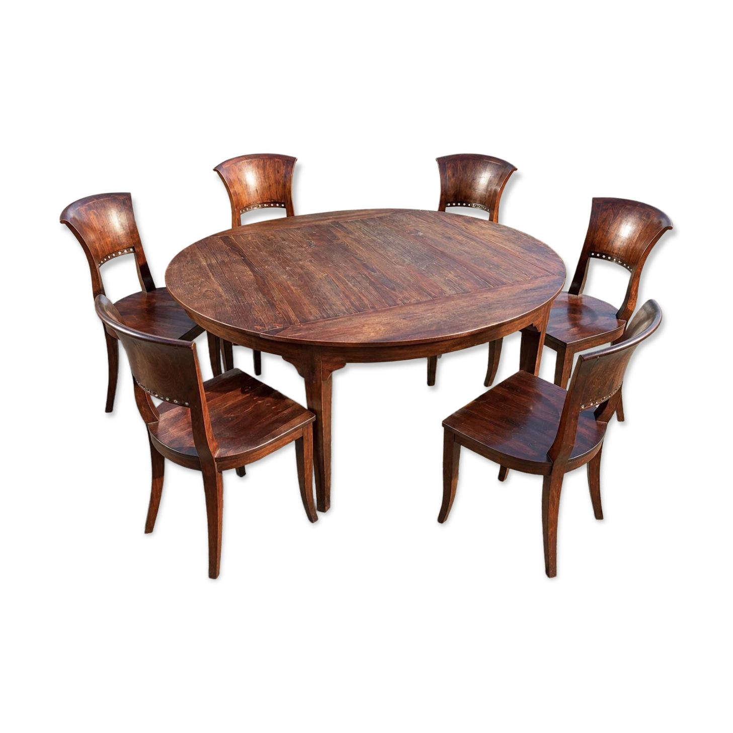 Round teak table 150 cm with 6 Indonesian chairs.
