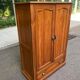 Small wardrobe / bonnetière in solid honey pine with 2 doors and 1 drawer.