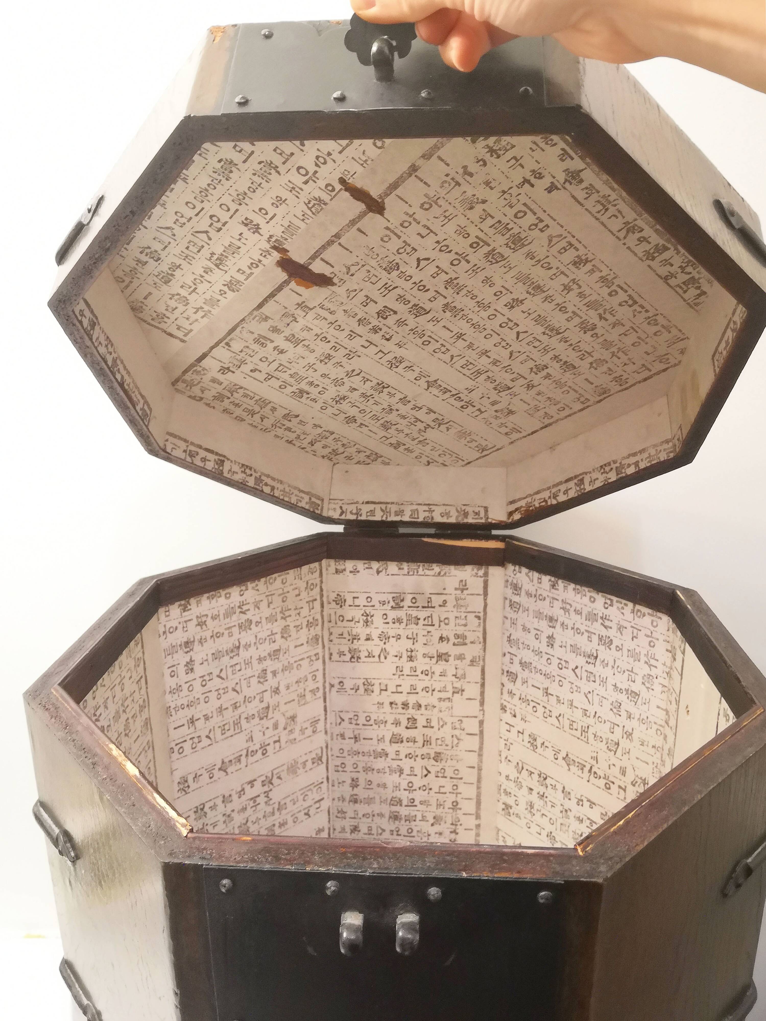 Octagonal wooden chest with metal ornaments from Asia