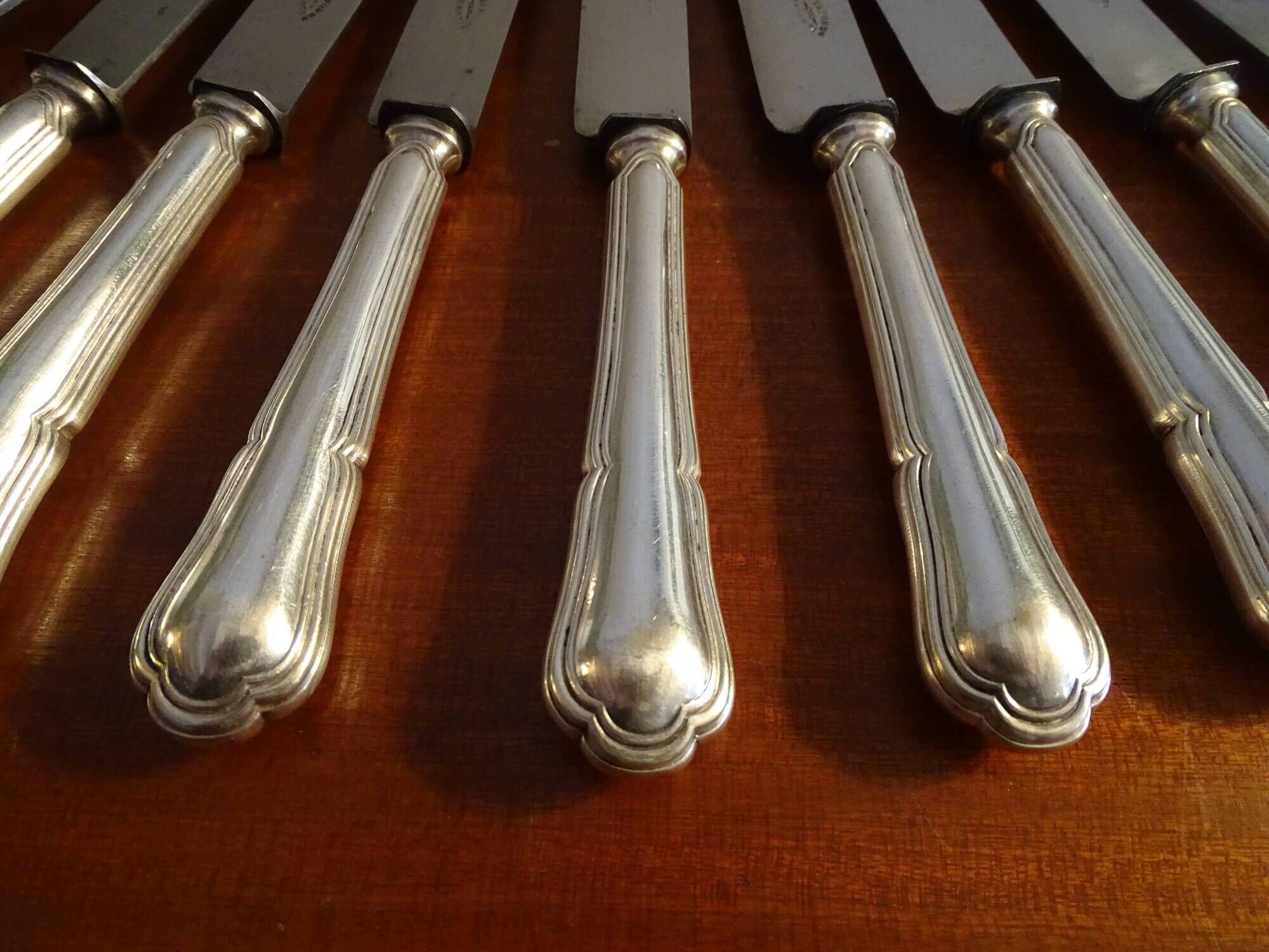 12 antique Art Deco knives silver metal and molten steel blades