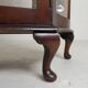 English Art Deco display cabinet on ornate legs, 1930s