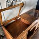 Counter, glass-fronted wooden workbench in dark wood, 8 drawers.