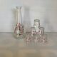 Carafe and 6 matching glasses in red and gold.