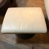 White leather armchair and ottoman