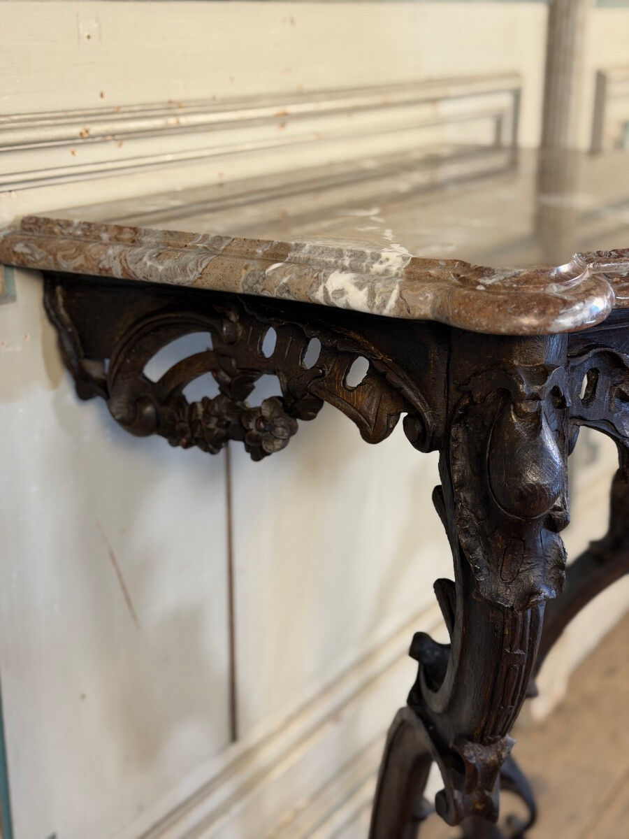 Console Louis XV en chêne sculpté, patine noire, XVIIIeme siècle