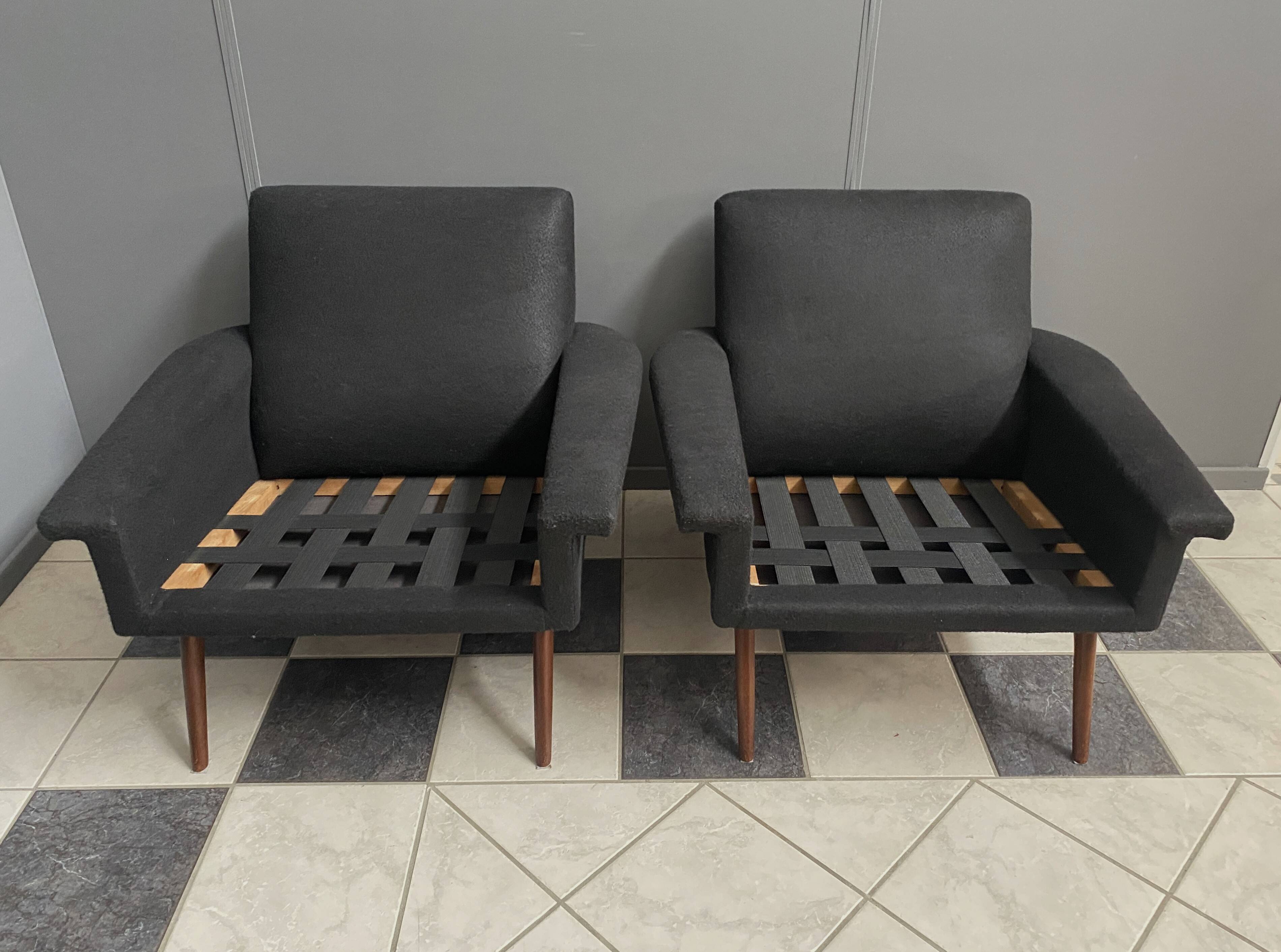 set of two black and white arm chairs 1960s