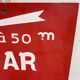 Tole sign painted "bar tobacco essence hairstyle"