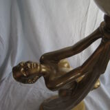 Lamp depicting a with a drape