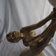 Lamp depicting a with a drape