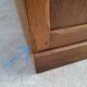 Oak workshop furniture with sliding doors.