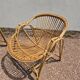 Rattan lounge with two armchairs and a vintage 1950s bench.