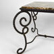 Table basse en fer forgé patiné et marbre, circa 1940