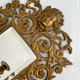 Bevelled mirror wall sconce in gilded bronze with 3 candle holders.