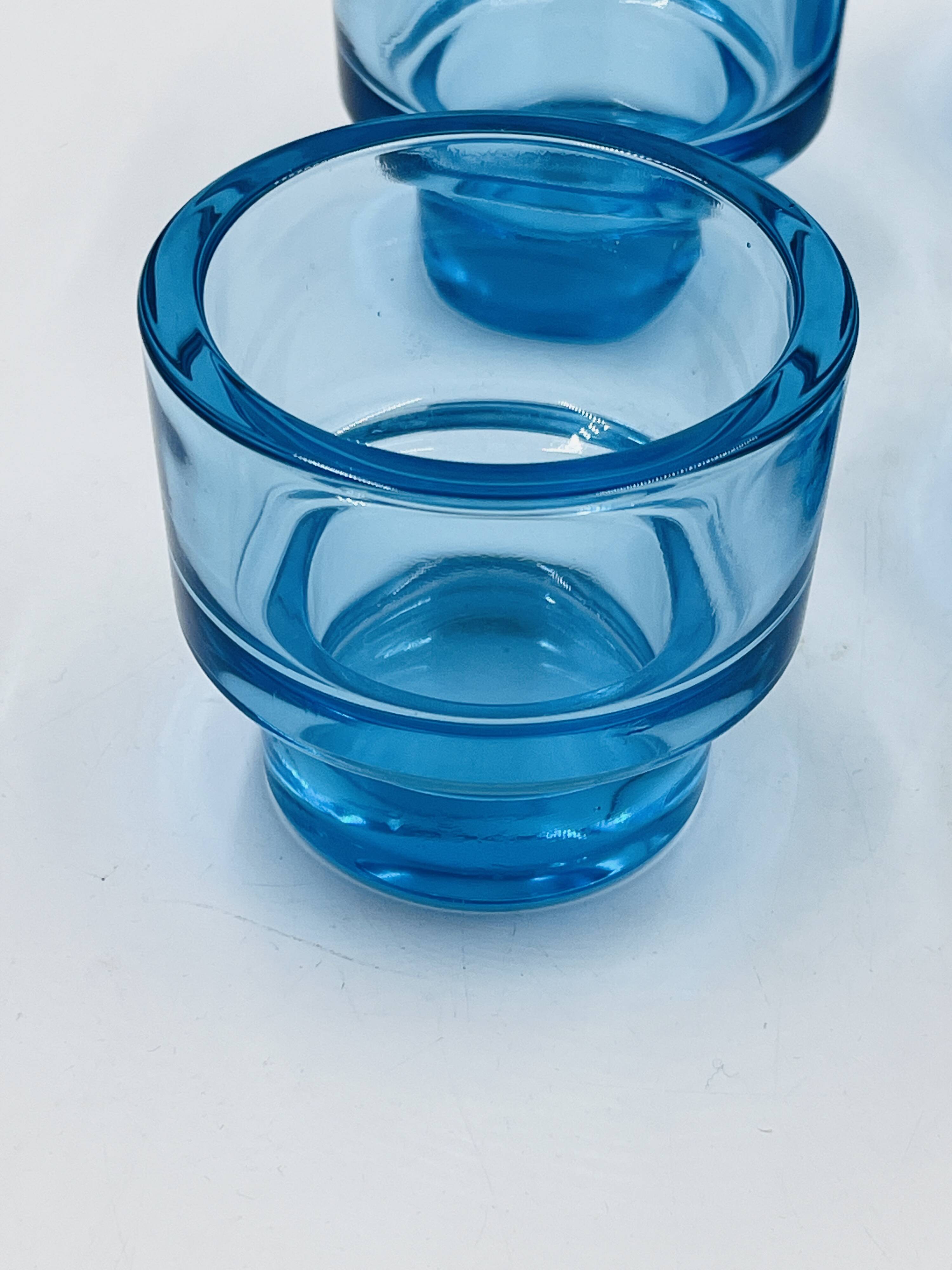 Set of 4 IKEA turquoise aquamarine glass candle holders.