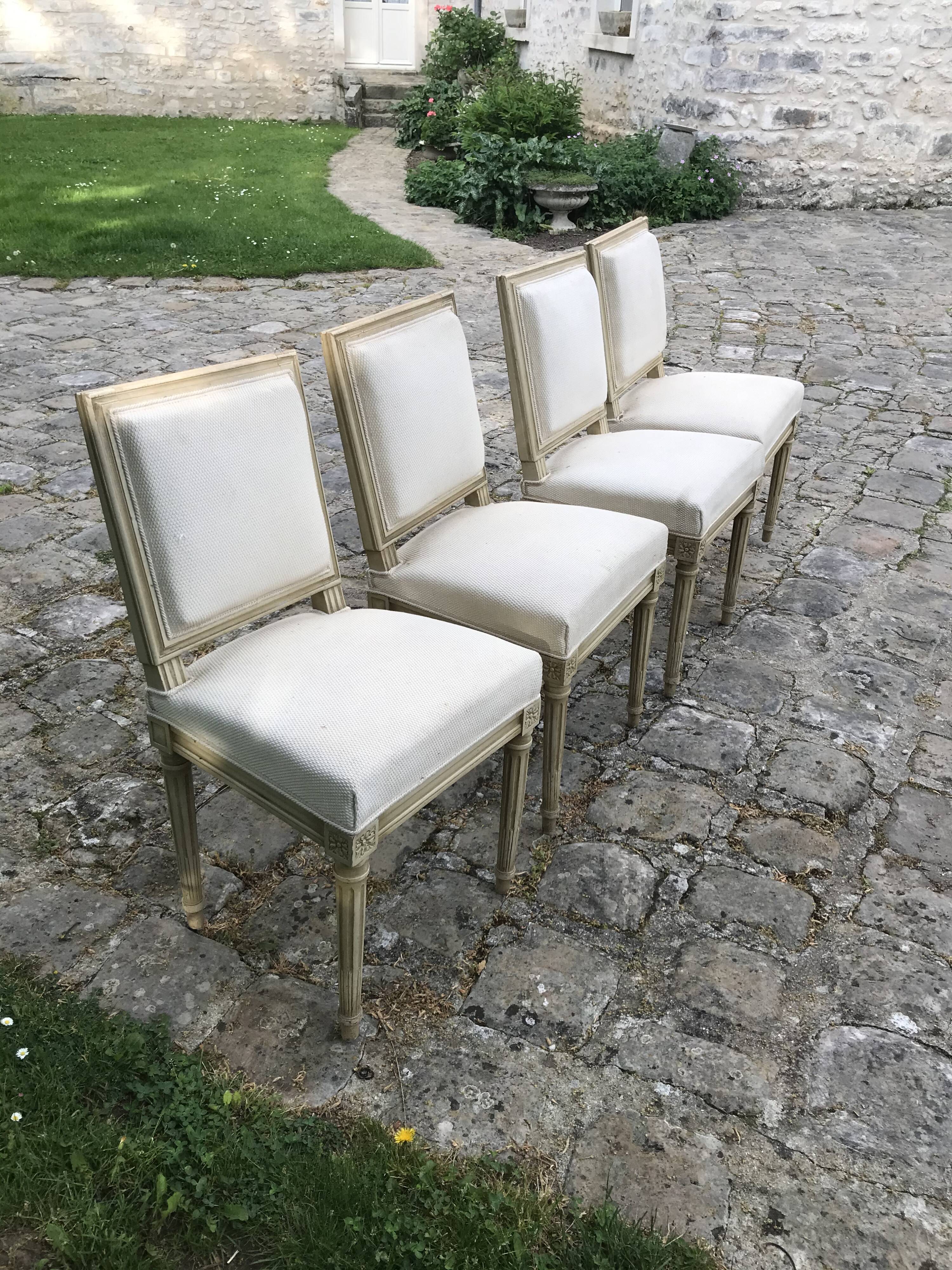 Series of 4 chairs of upholsterer style Louis XVI